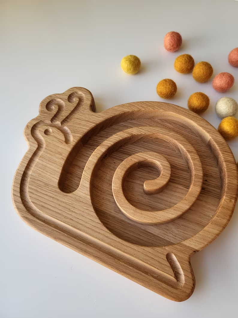 Wooden snail for fine motor skills activities