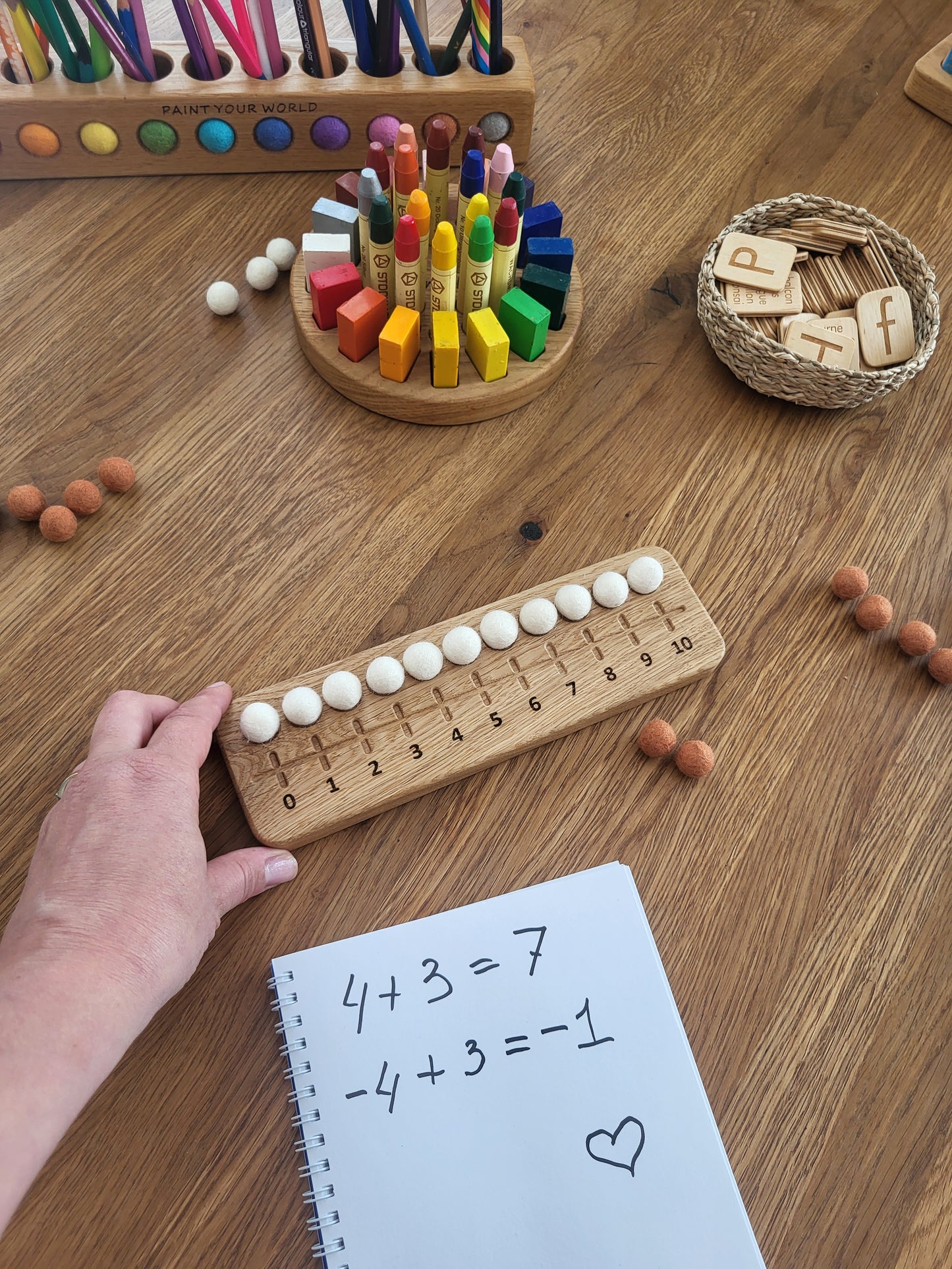 Zehnerrahmen mit Filzkugeln