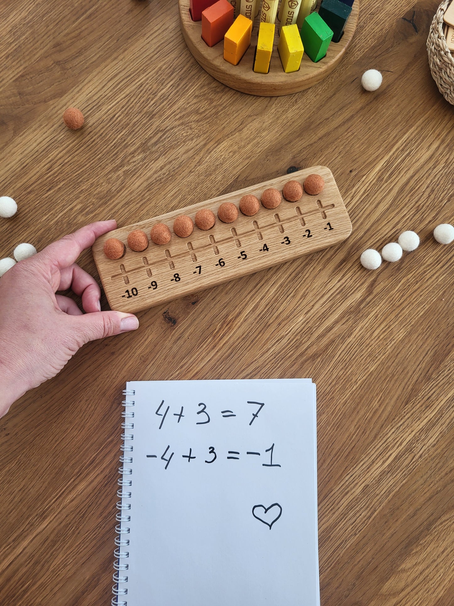 Zehnerrahmen mit Filzkugeln