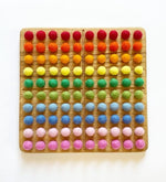 Load image into Gallery viewer, Montessori hundred board with numbers 1-100 and felt balls
