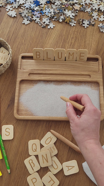 Sand tray with German letters cards