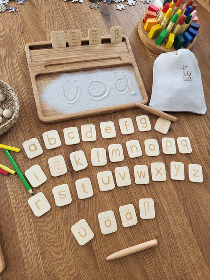 Sand tray with German letters cards