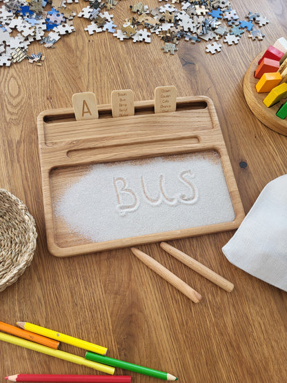 Sand tray with German letters cards
