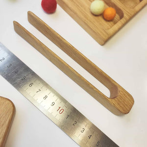 Montessori wooden tweezers or tongs fine motor skills development gift for kids for toddler Hand-eye coordination Sensory play Learning through play Educational Practical life skills Early childhood development Homeschooling Montessori classroom materials